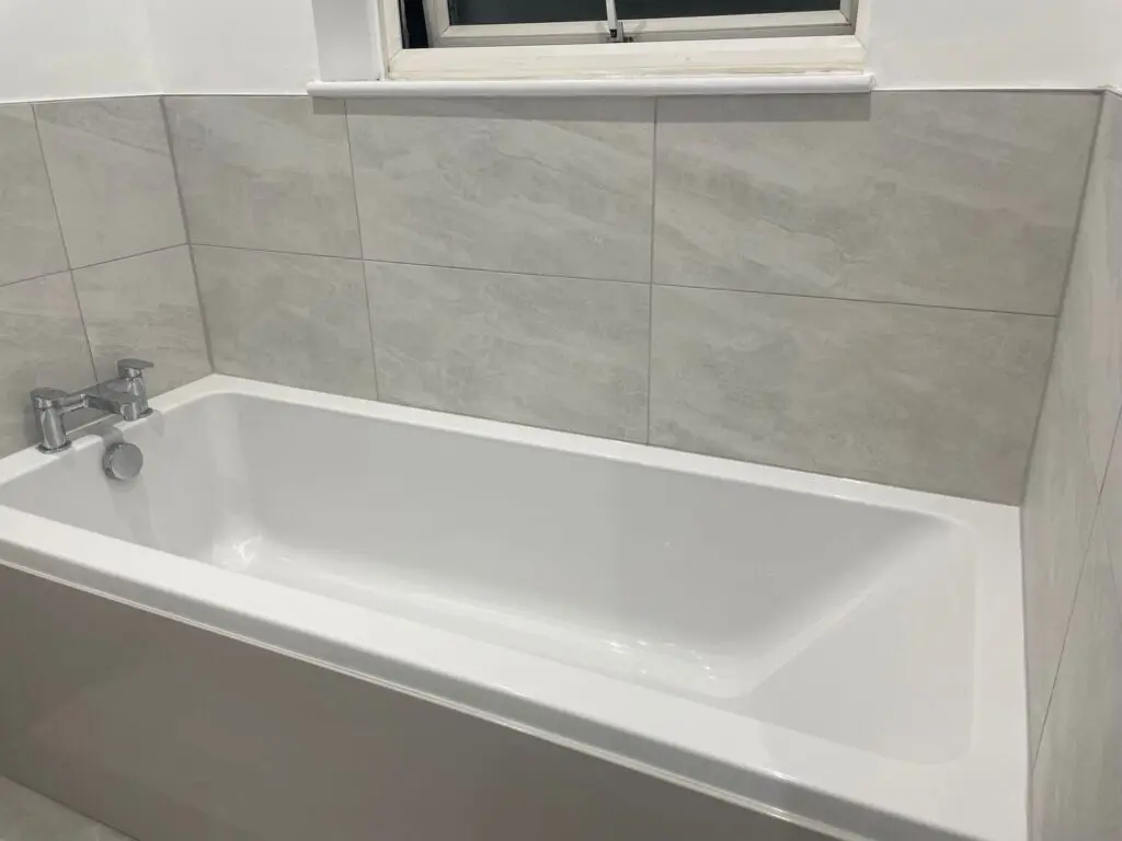 Eastbrook bath with grey tiles