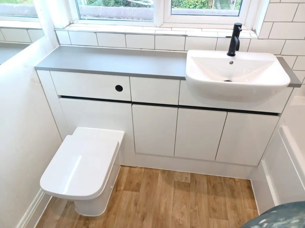 Bathroom furniture with black inserts