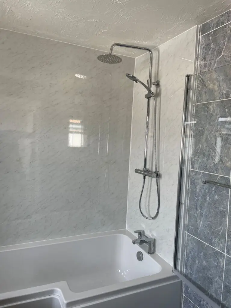Shower bath with aqua panels