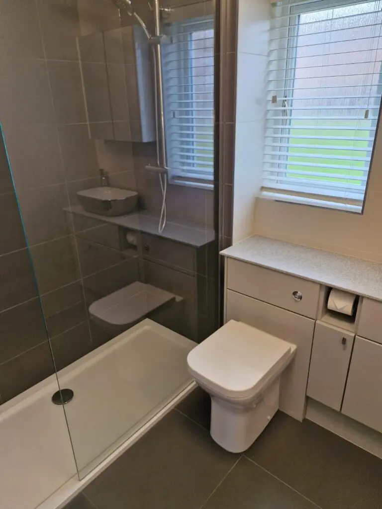 Walk in shower room with Atlanta furniture