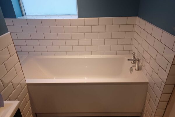 Metro white tiles around bath