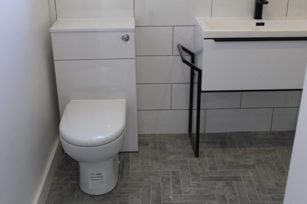 Bathroom Units in White Gloss and Black taps