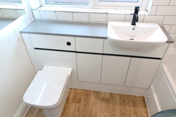 Bathroom furniture with black inserts